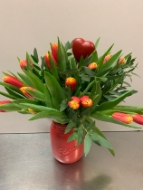 Red vase with tulips